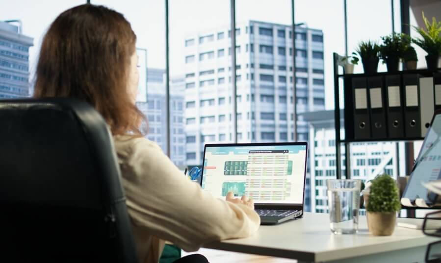 professional female leader evaluating trading risks before making investment